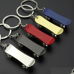 Key Rings Sport Rotatable Skateboard Keychain Key Rings Holders Bag Hangs Fashion Jewelry For Women Mens Gift Drop Delivery Dhzsy