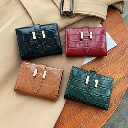 Fashion luxury patent leather short purse women's new Korean version of two fold crocodile wallet students everything folding card bag