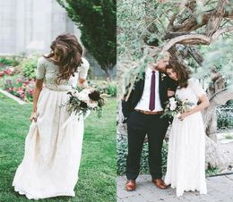 Splendidi abiti da sposa in pizzo abito da sposa scottatura maniche corte a maniche corta Cristalli di design in rilievo un treno di linea su misura con un vestido de novi