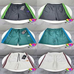 Shorts masculinos mistura cor agulhas shorts 2022 homens mulheres high street 1 1 nylon agulhas malha shorts perna borboleta awge calções de trilha t221129 t221129