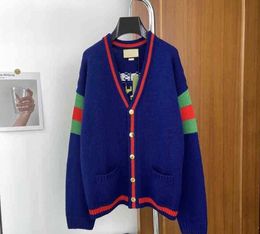 2023 Women's Sweaters Colour matching V-neck cardigan 100th anniversary series knitted stripe medium length jacket men's and