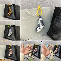 Leopard print twist keychain party creative bag pendant car key chain school bag cute plush phone decor accessories