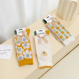 Autumn and winter socks children yellow flowers small fresh cotton medium tube double needle long tube