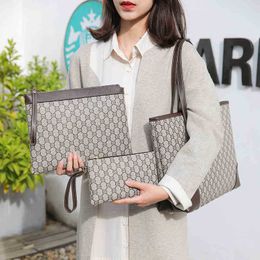 Stuff Sacks 2023 19 new simple and versatile hbag printed messenger trend mother son three piece set women's