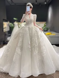 2023 Arabic ball gown Wedding Dresses Luxury Dubai Sparkly Crystals Long Sleeves Bridal Gowns Court Train Tulle Skirt robes de mariee