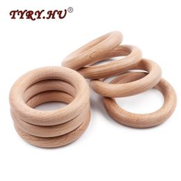 Baby Teethers Toys TYRY.HU 50Pcs 40/55/70mm Beech Wood Ring Wooden Teether Ring Kid Gift Food Grade Silicone Children's Goods Kid Teething Toys 221007