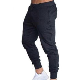 Erkek pantolon erkekler gevşek spor koşu şerit eşofmanları fitness eğitim pantolonlar erkek düz pantolon eşofman jogging spor giyim 221007