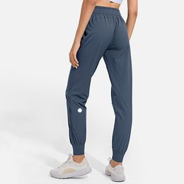 LL Women Jogging Yoga Ninth Pants Pocket Fitness Soft High Waist Hip Lift Elastic Casual Pants Drawstring Legs Sweatpants