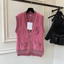 2022 Женские свитеры Новый осень зимний розовый цвет одиночный вязаный жилетки Женщины V-образные вырезы