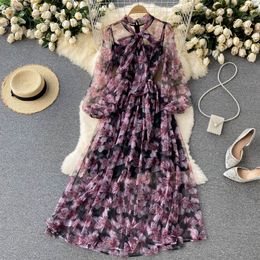 Holiday style printed large hem dress Spring new pattern tie bow collar long sleeve waist cut floral long skirt