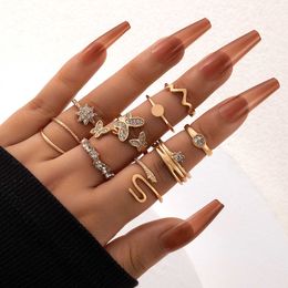 New sweet wind butterfly inlaid diamond snake shaped opening ring zodiac snowflake nine piece ring set