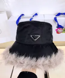 designer Inverted triangle mark fisherman hat feather stitching winter warm shade Korean version of fashion travel basin hats female trend