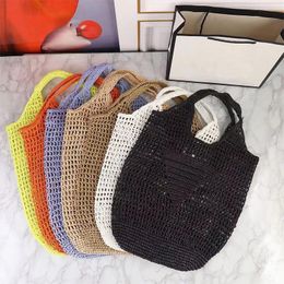 Bolsa de palha trançada para mulheres Bolsas de viagem de verão para praia Bolsa Clutch RAFFIA TRANÇADA Bolsa de menina de temperamento suave Oca Design Letra Decoração Atacado