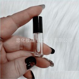 Packing Bottles Packing Bottles Portable Empty Lip Gloss Container Womens 0.8Ml Mini Plastic Vacuum Flask Lipstick Lipglosses Cosmeti Dhzus