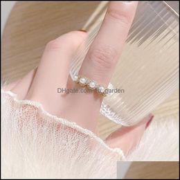 Wedding Rings Wedding Rings Korean Exquisite Micro Inlaid Cz Angle Wing Pave Imitation Pearl Ring For Women Cubic Bling Zirconia Bag Dhmq0