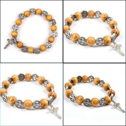 Bangle Bangle Komi Natural Solid Wood Elastic Wire Alloy Saint Religious Rosary Bracelet Men Women Catholic Jesus Christ Jewelry Pse Dh2T6