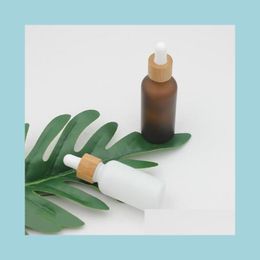 Packing Bottles Frosted Matte Amber White Glass Dropper Bottle 15Ml 30Ml 50Ml With Bamboo Cap 1Oz Wooden Essential Oil Bottles Drop Dhucj