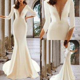 Meerjungfrau rückenfreies Hochzeitskleid 2023 Brautkleider nach Maß V-Ausschnitt Hofzug Satin Langarm Perlenstickerei Plus Size Vestidos De Novia
