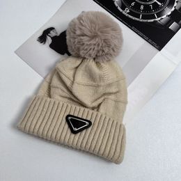 Designer American hair ball hat women's wool knitted warm flanged autumn and winter fashion triangle label hats