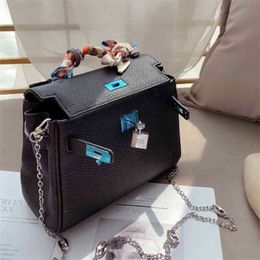 Clearance Horizontal square solid color small belt cover bag black lock soft handle sling single shoulder