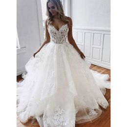 A-Line White Tulle Appliques Bridal Dress Spaghetti Straps Backless Wedding Dresses Lace Ruffled Beach Dress Vestido De Noiva