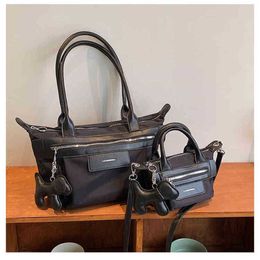 Bags 2022 autumn and winter New Black Knight dumpling bag female summer cool SA minority portable sling single shoulder cross car Purses