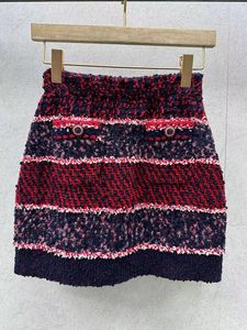 Spódnice moda czerwony niebieski kontrast w paski tkana mini spódnica dla kobiet 2024 Wysokiej jakości kolor boczny guziki