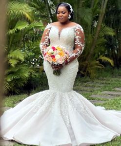 Ślub afrykańskie seksowne sukienki suknie ślubne luksusowe koronkowe aplikacje kryształowe koraliki iluzja klejnot szyja syrena długie rękawy niestandardowe
