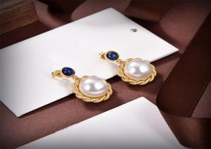 Orecchini moda donna Orecchini a bottone Lettere classiche Diamante dorato Orecchino di perla Designer di marca di lusso Gioielli di alta qualità Seven Sty3592219
