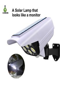 Lampada da parete di sicurezza solare Telecamera fittizia per esterni Wireless 77 LED Spot Light 3 modalità Luci con sensore di movimento per Garden Home Park2764027