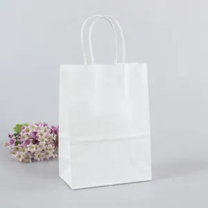 Geschenkverpackung 10 teile / los Einfache weiße Farbe Papiertüte Festival mit Griffen Modische Stofftaschen Hervorragende Qualität 27 21 11 cm