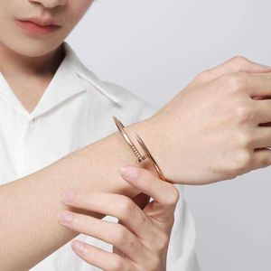 Um clássico japonês e coreano casal pulseira de unhas simples estudante feminino personalidade criativa tendência masculino anel decoração i0lw