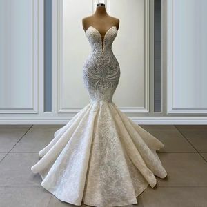 Abiti da sposa in pizzo a maniche lunghe Illusion O Neck Sexy applique senza schienale Perline Paillettes Champel Train Abiti da sposa Realizzati su misura