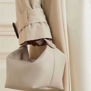Kadınlar için Cowhide Tasarımcı Çantaları Les Mini Bains Premium Elde Taşınmış 2024 El çantası Yeni Deri Lüks Tasarım
