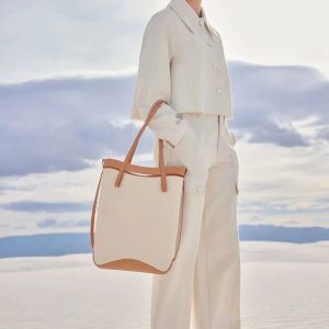 Kobiety luksurys torebki pienowo -plażowe plażowe roboty pętla torebka designerka torby na torby modne skórzane męskie kupujący Bagnylon Canvas Bag