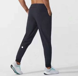 Lulu Men Pants Yogas Strój Longjogger Sport Szybki suchy sznurka gimnastyczna Kieszenie dresowe spodnie spodnie męskie mens elastyczne fitness mantfrutru oo