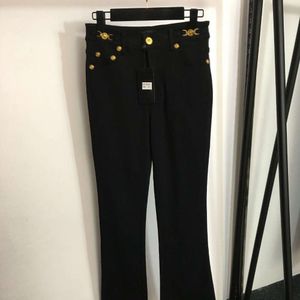 Basic & Casual Dresses Women's Solid Color Beauty Portrait Gold Button Decoration Slimming Denim Pants with Flared Bottoms