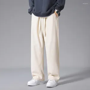 Męskie spodnie jesień i zima 2024 Corduroy moda splice elastyczna talia sznurka sznurka solidny kolor luźny sport swobodny
