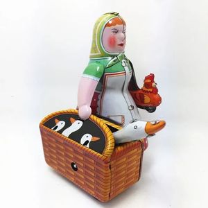 Funny Classic collection Retro Clockwork Wind up Metal Walking Tin farmer robot woman with the goose Mechanical toy gift 240103