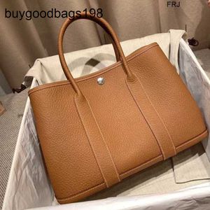 Designer Garden Party Bags All Manual Wax Line Bag Togo Cowhide Business Hand Commuter Womens Tote Have Logo ZRNL