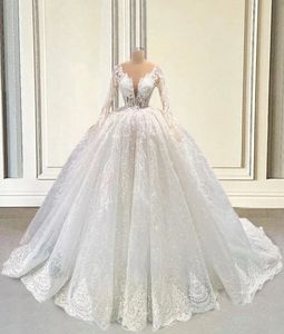 Białe sukienki ślubne nowe suknie ślubne formalne aplikacje z koralikami niestandardowe zamek z kości słoniowej koronki w górę w rozmiarze o iluzji z iluzją o długim rękawie w rozmiarze