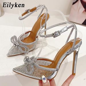 Eilyken Pvc Şeffaf Kadınlar Pompalar Seksi Kelebek Knot Kristal Yüksek Topuklu Noktalı Ayak Parçası Düğün Prom Sandals Bahar Ayakkabıları 240103