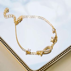 Armband guldpläterade små fiskarmband kvinnor inlagda högkol diamant nisch design armband europeisk och amerikansk stil enkel