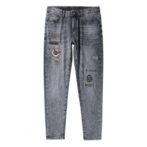 2023 Spring/Summer Thin European och American Trendy Popular Print Elastic Slim Fit Small Right Ben mångsidig 9-tums jeans för män
