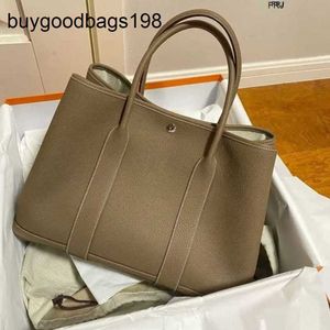 Designer Garden Party Bags äkta läder kvinnor stor kapacitet shopping pendlare handväska 2024 ny en axel crossbody tote har logotyp thd5