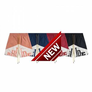 Pantaloncini sportivi casual patchwork con stampa di lettere di etichetta di moda americana per uomo e donna pantaloni larghi con coulisse a quarti ad asciugatura rapida