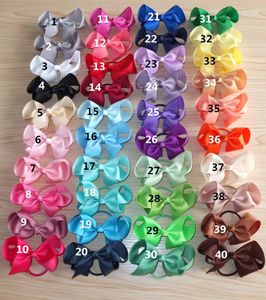 40 kolorów Dostępne 4 -calowe łuk włosów z elastycznymi opaskami Bobble Pętle Dziewczyny Dziewczęta Kucyk Ponytail Bows Butique Hair Bobble Bows 240103