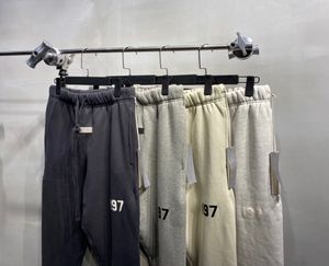 herr joggers män byxor svett byxor designer byxor män kvinnor byxor 1977 bokstäver bästa version lös passform 460 g fleece ren bomull grossist