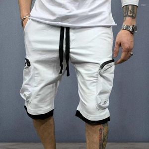 Mäns shorts unga sommar elastiska midja streetwear lösa ren färg män last