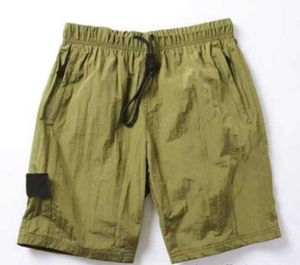 Praia 2023 Shorts de verão Mens Calças Curtas Correndo Solto Processo de lavagem de secagem rápida de tecido puro na moda casual hip-hop Ins Stones Island Leisure design 6611ess